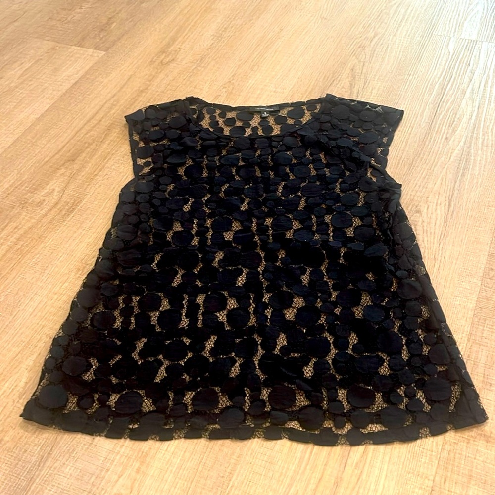 Fun Saks shirt. Perfect staple piece.